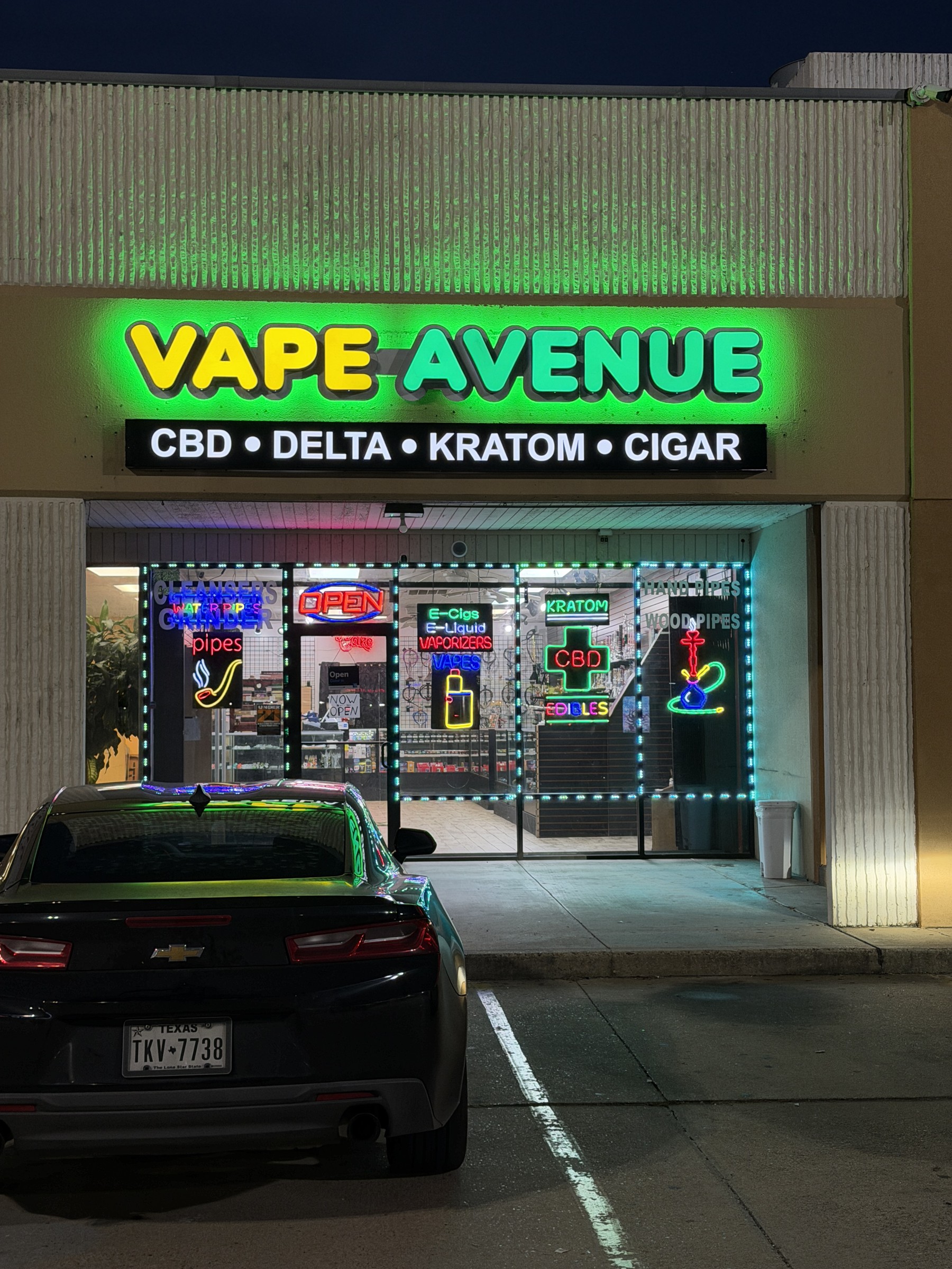 Vape Avenue storefront with illuminated signage in Humble, Texas